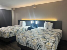 Ropa de cama de alta calidad, cortinas opacas, wifi gratis