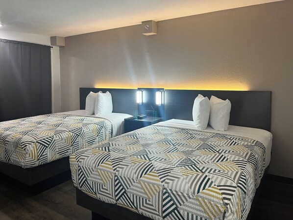 Premium bedding, blackout curtains, free WiFi, bed sheets