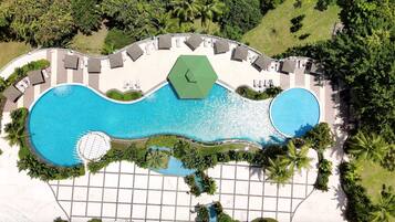 Outdoor pool, pool umbrellas, sun loungers