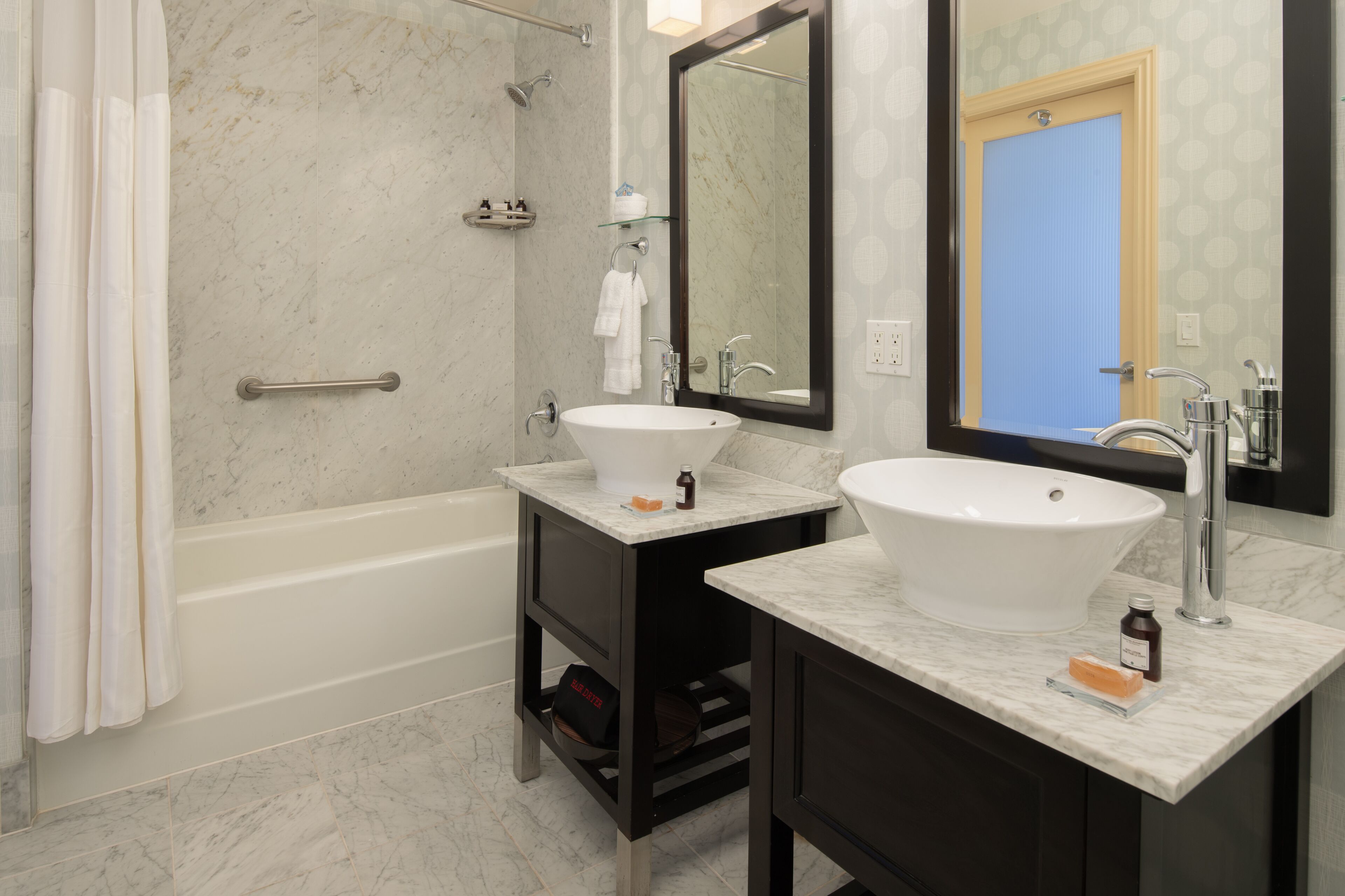 shattuck suite | bathroom | shower, designer toiletries, hair dryer, towels