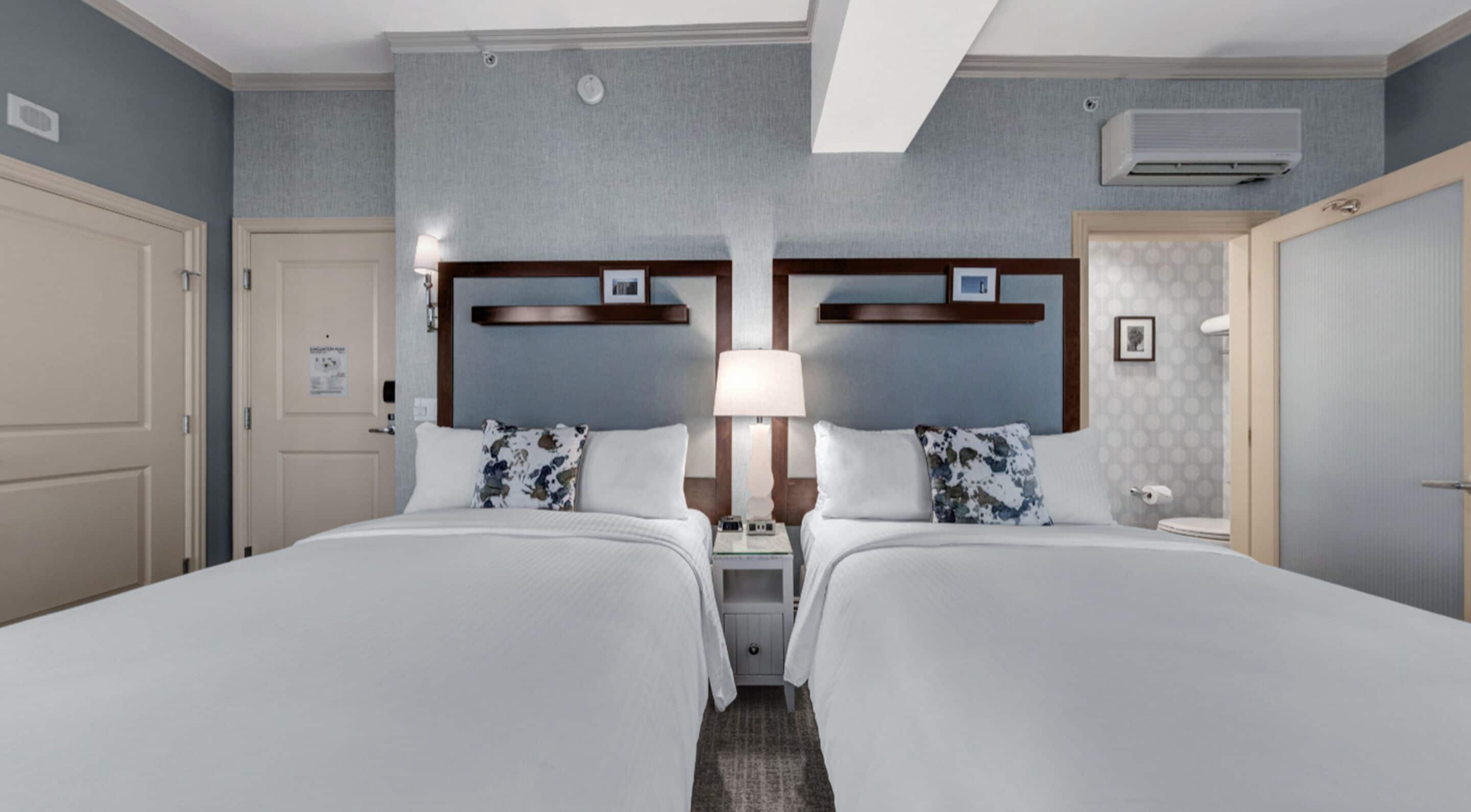 deluxe room, 2 double beds | 1 bedroom, premium bedding, desk, iron/ironing board