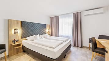 Literie hypoallergénique, coffres-forts dans les chambres, bureau