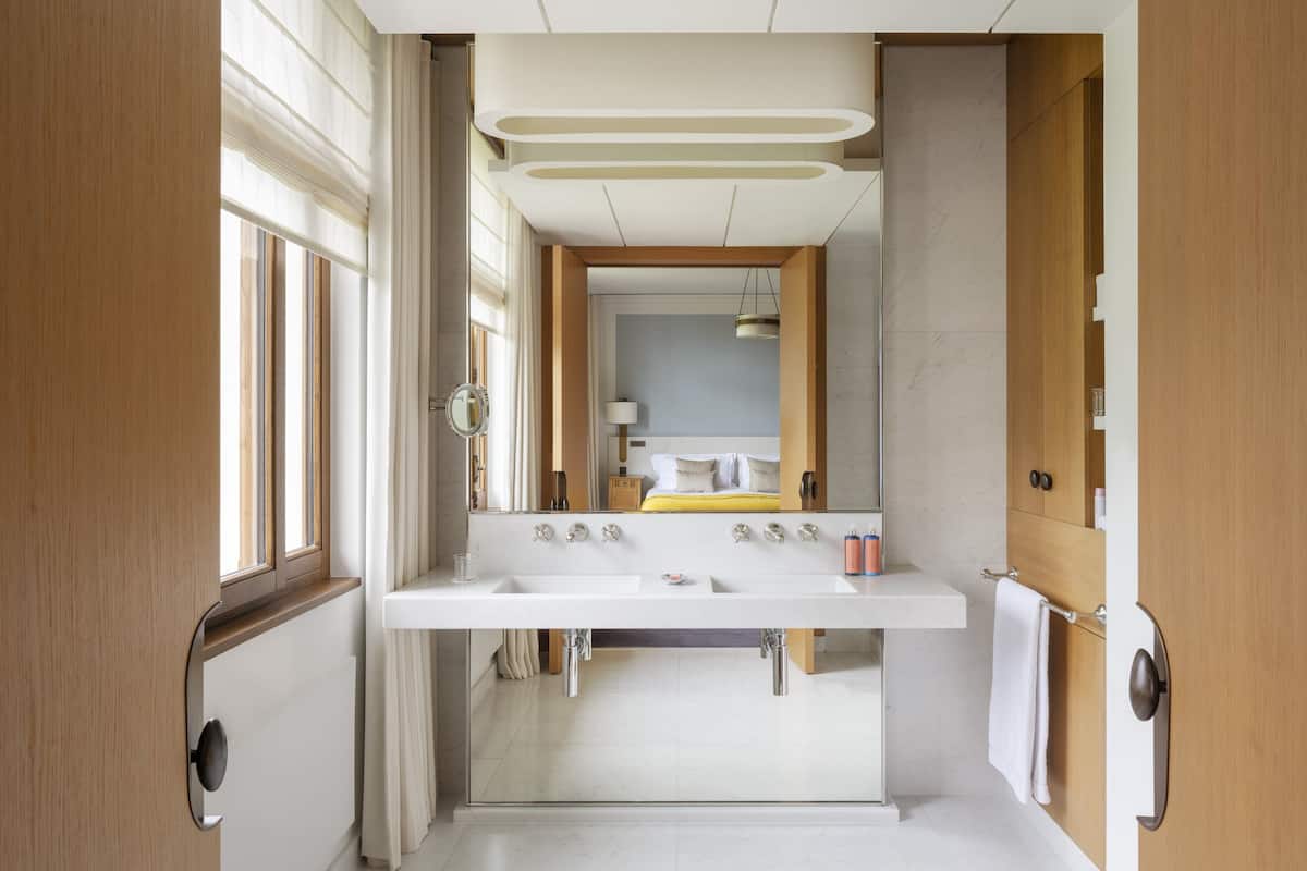 Designer toiletries, hair dryer, bathrobes, slippers