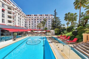 Outdoor pool, open 8:00 AM to 8:00 PM, pool umbrellas, sun loungers