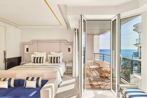 Junior Suite, Balcony, Partial Sea View | Frette Italian sheets, premium bedding, minibar, in-room safe