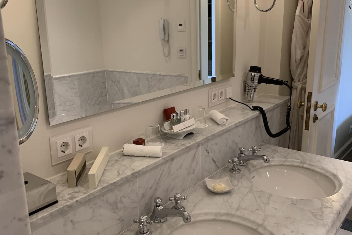 suite | bathroom | combined shower/bathtub, designer toiletries, hair dryer, bathrobes