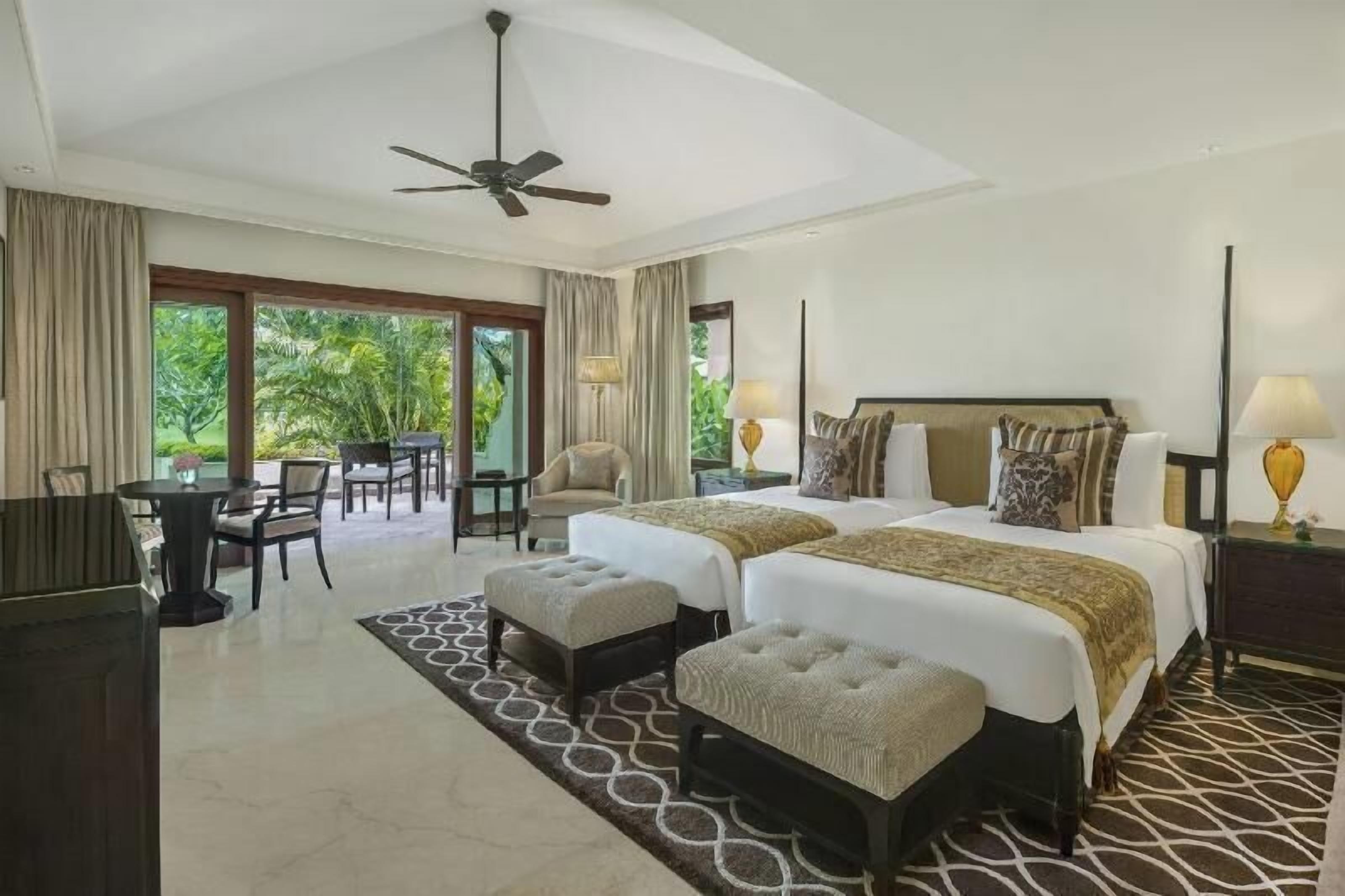 Premium bedding, down comforters, Tempur-Pedic beds, minibar