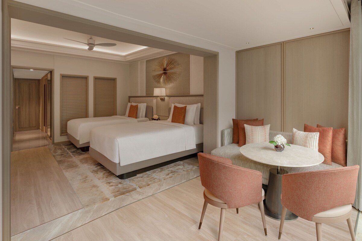 Habitación Premier, 2 camas individuales, vistas a la laguna | Ropa de cama de alta calidad y edredones de plumas