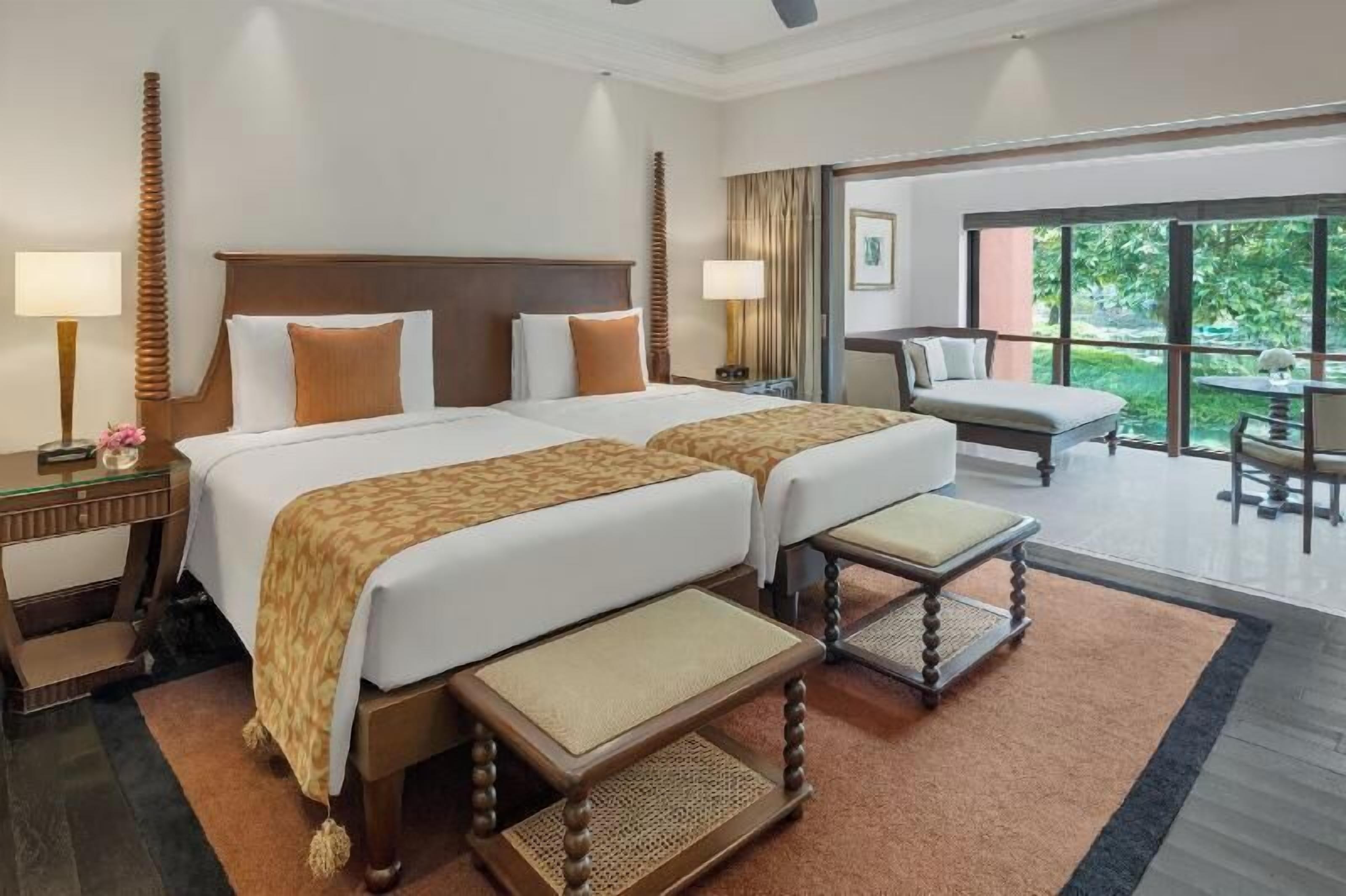 Premium bedding, down comforters, Tempur-Pedic beds, minibar