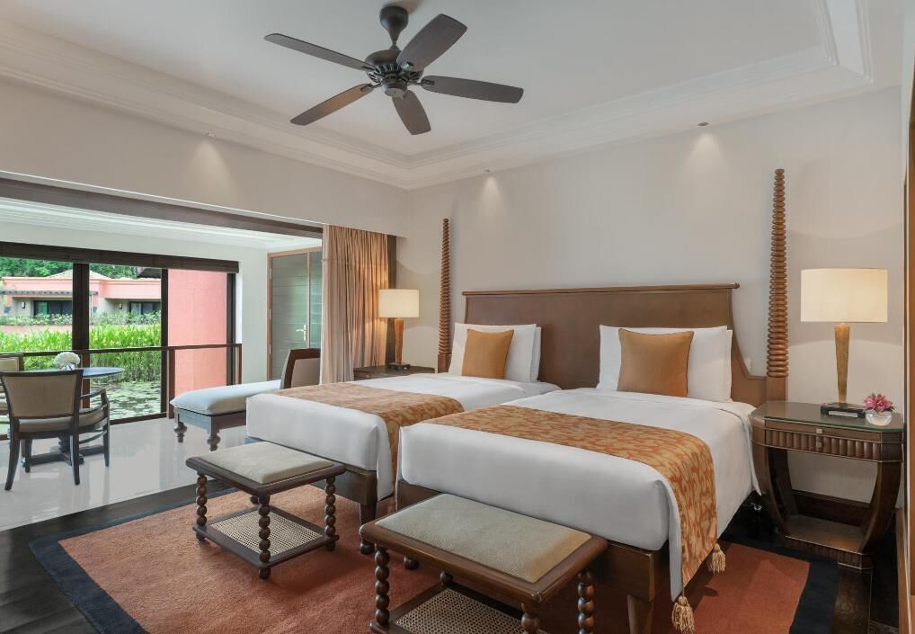 Premium bedding, down comforters, Tempur-Pedic beds, minibar