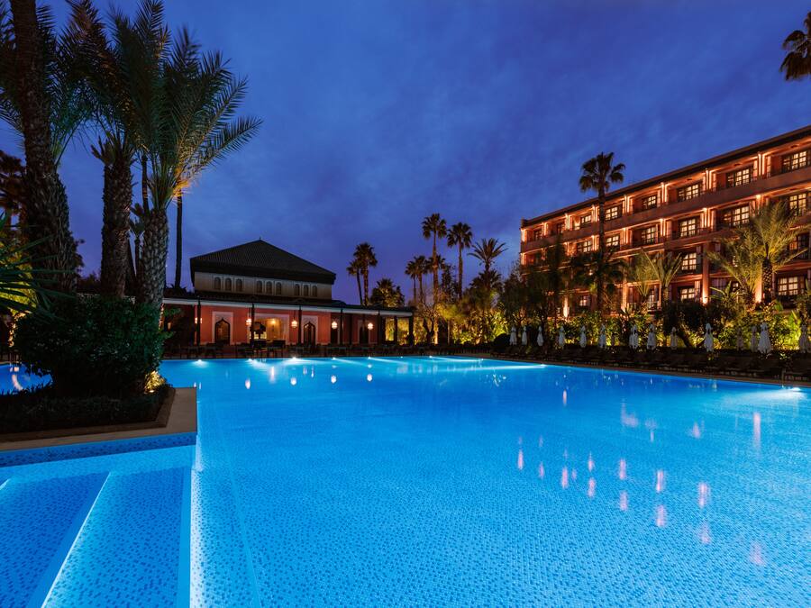 Indoor pool, outdoor pool, pool umbrellas, sun loungers