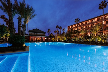 Indoor pool, outdoor pool, pool umbrellas, sun loungers