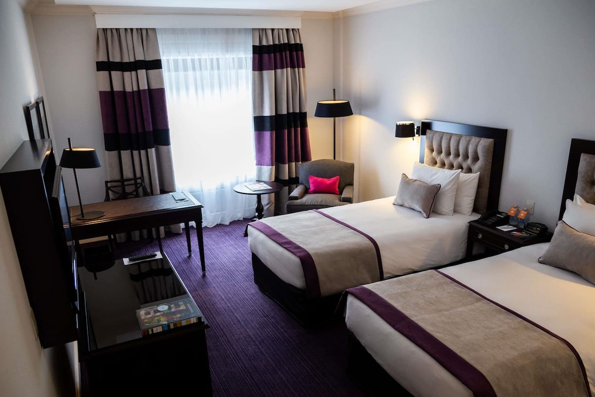 Hypo-allergenic bedding, minibar, in-room safe, desk