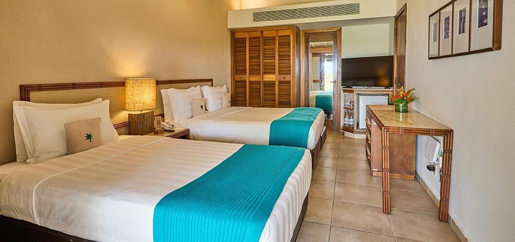 Hypo-allergenic bedding, free minibar, in-room safe, desk