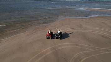 On the beach, free beach cabanas, sun-loungers, beach umbrellas