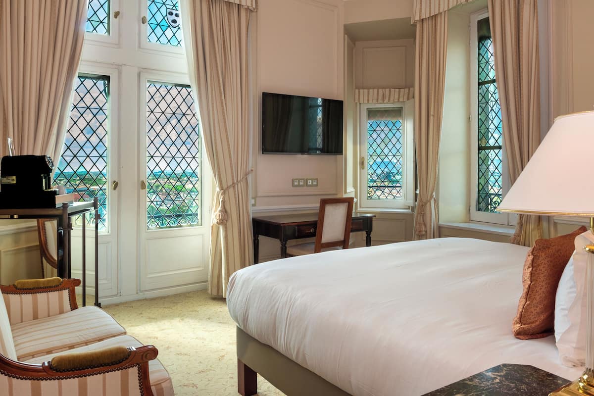 Suite, 1 cama King size | Ropa de cama de alta calidad, camas con pillow-top y minibar