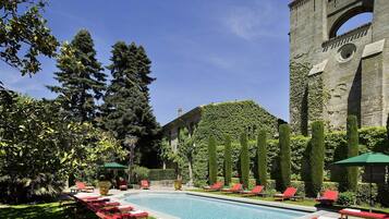 Seasonal outdoor pool, open 8:00 AM to 8:00 PM, pool umbrellas