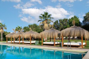 Indoor pool, seasonal outdoor pool, pool umbrellas, sun loungers