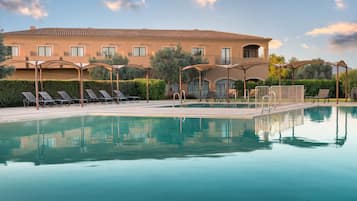 Indoor pool, seasonal outdoor pool, pool umbrellas, sun loungers