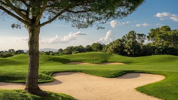Enjoy a round of golf amidst rolling hills and lush scenery.