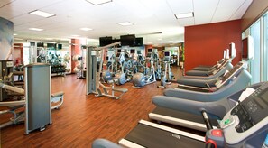 A gym with treadmills, elliptical machines, and weight equipment. - Fremont Marriott Silicon Valley (Fremont)