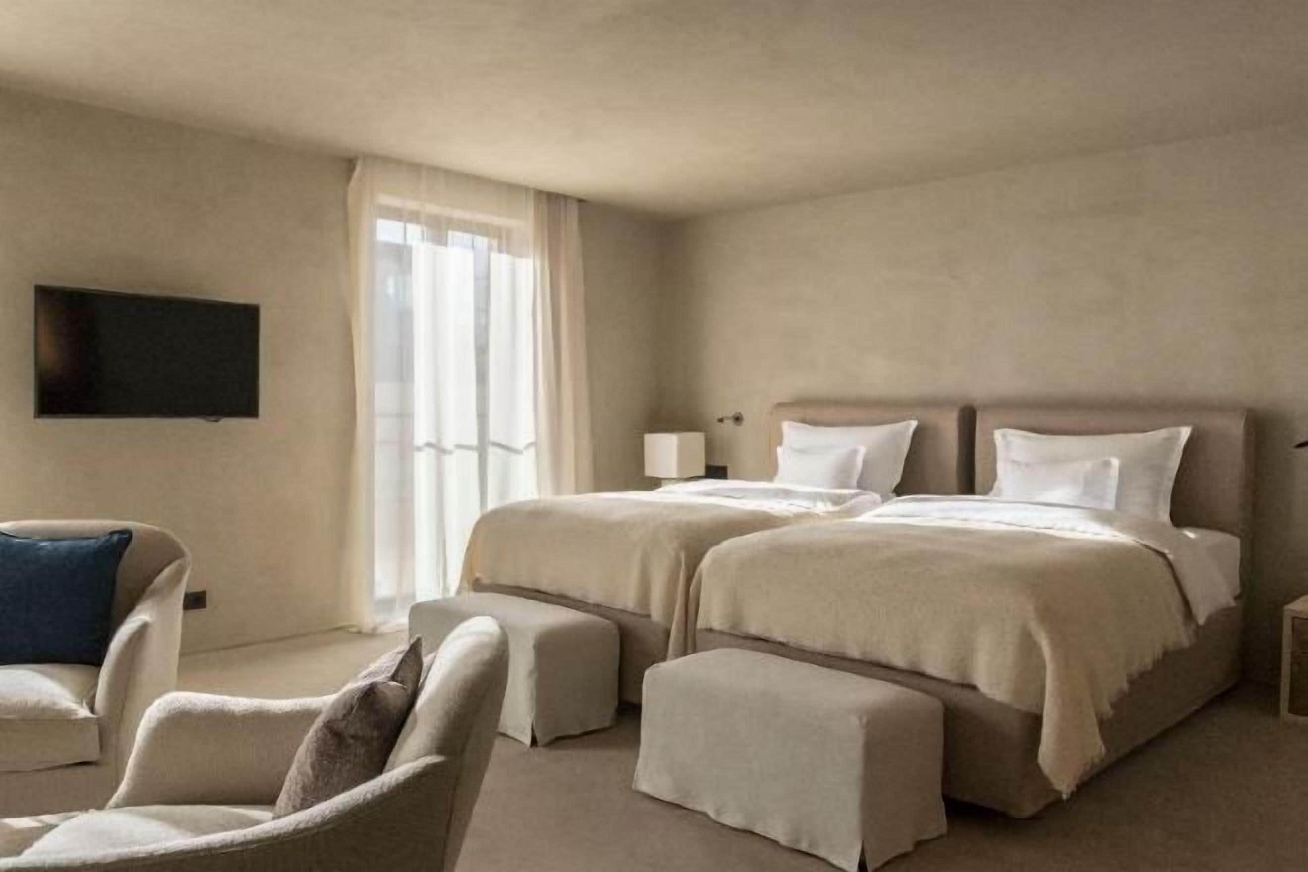 Premium bedding, down duvets, minibar, in-room safe