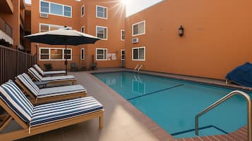 Outdoor pool, open 10:00 AM to 8:00 PM, sun loungers
