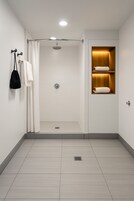 Junior Suite, 1 King Bed | Bathroom | Free toiletries, hair dryer, towels, soap