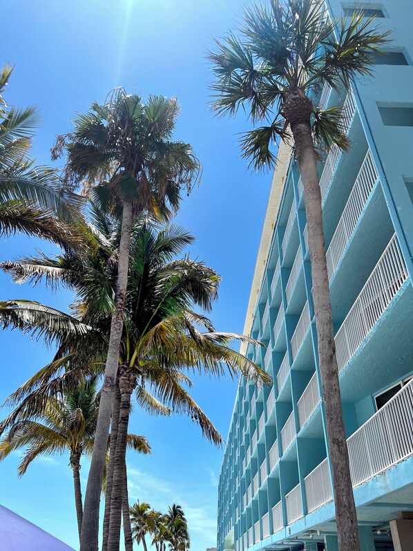 A multi-story hotel with a blue exterior and balconies. - Lani Kai Beachfront Resort (Fort Myers Beach)