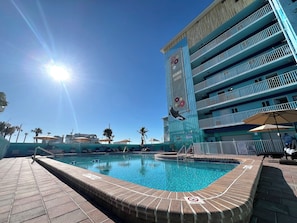 Outdoor pool, pool umbrellas, sun loungers