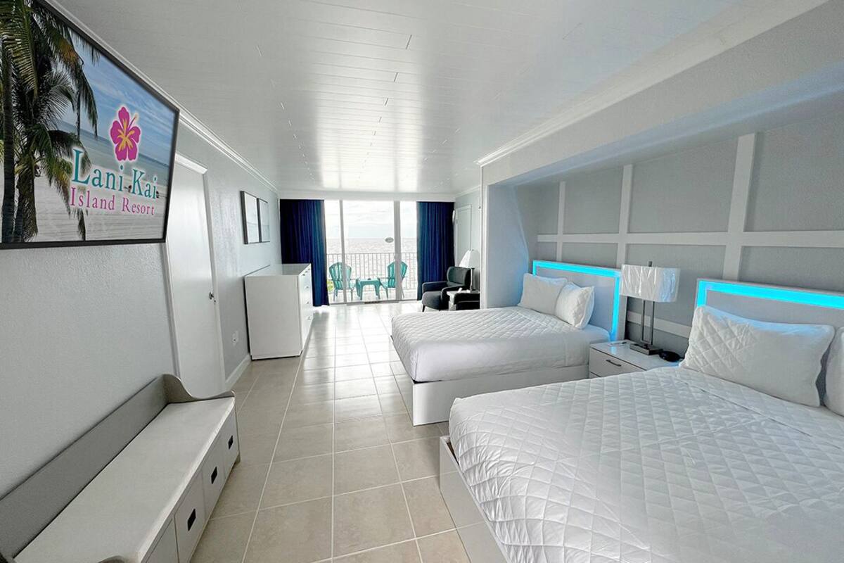 standard beachfront, balcony, two doubles | 1 bedroom, individually decorated, laptop workspace, iron/ironing board