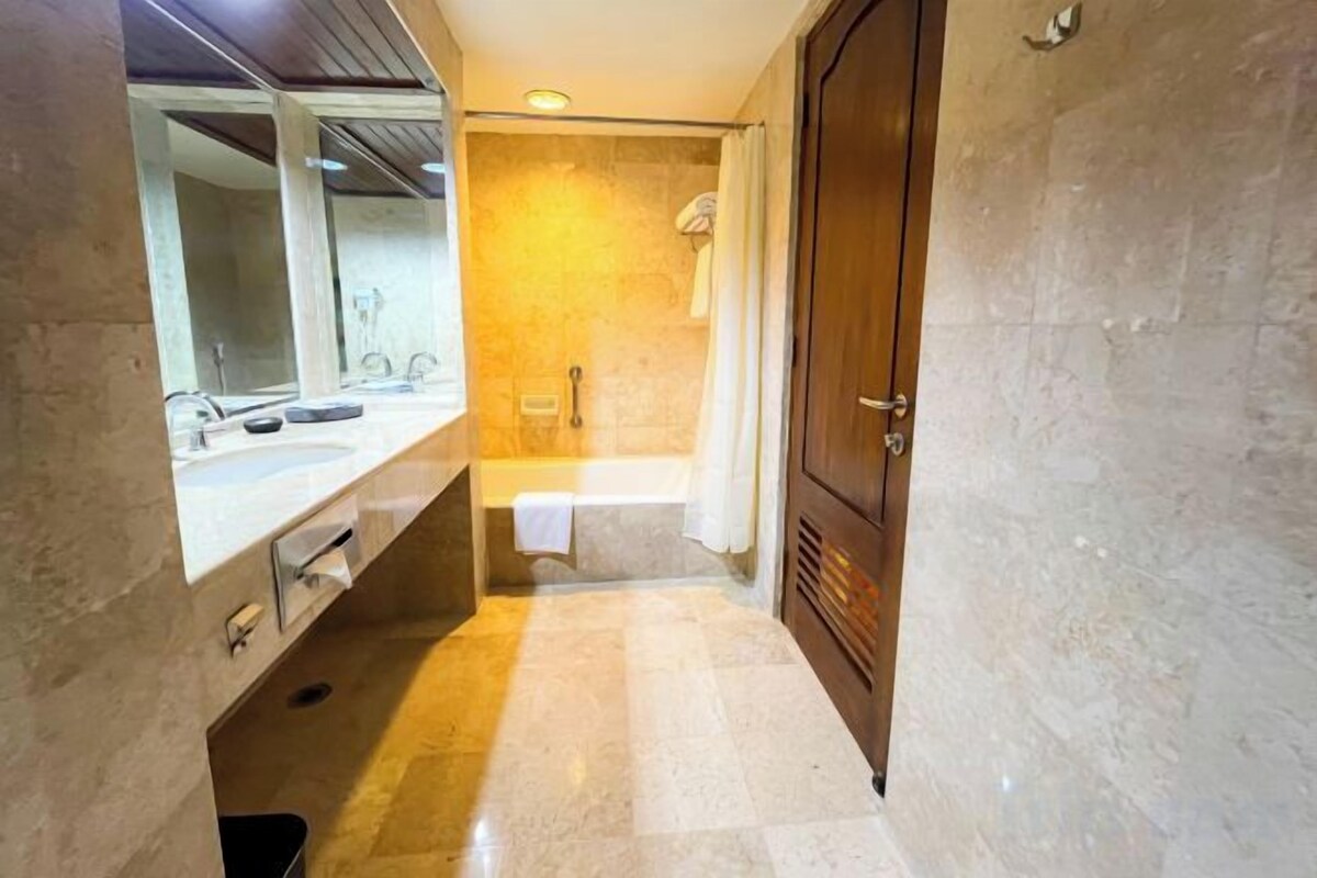 Shower, free toiletries, hair dryer, slippers