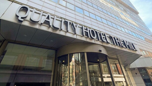 A modern hotel building with a glass facade and a prominent sign reading "QUALITY HOTEL". - Quality Hotel the Mill (Malmö)