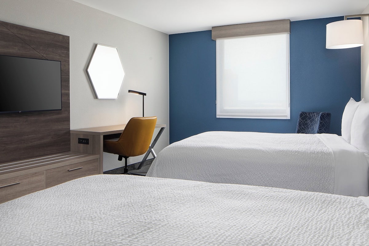 Desk, iron/ironing board, free cribs/infant beds, rollaway beds