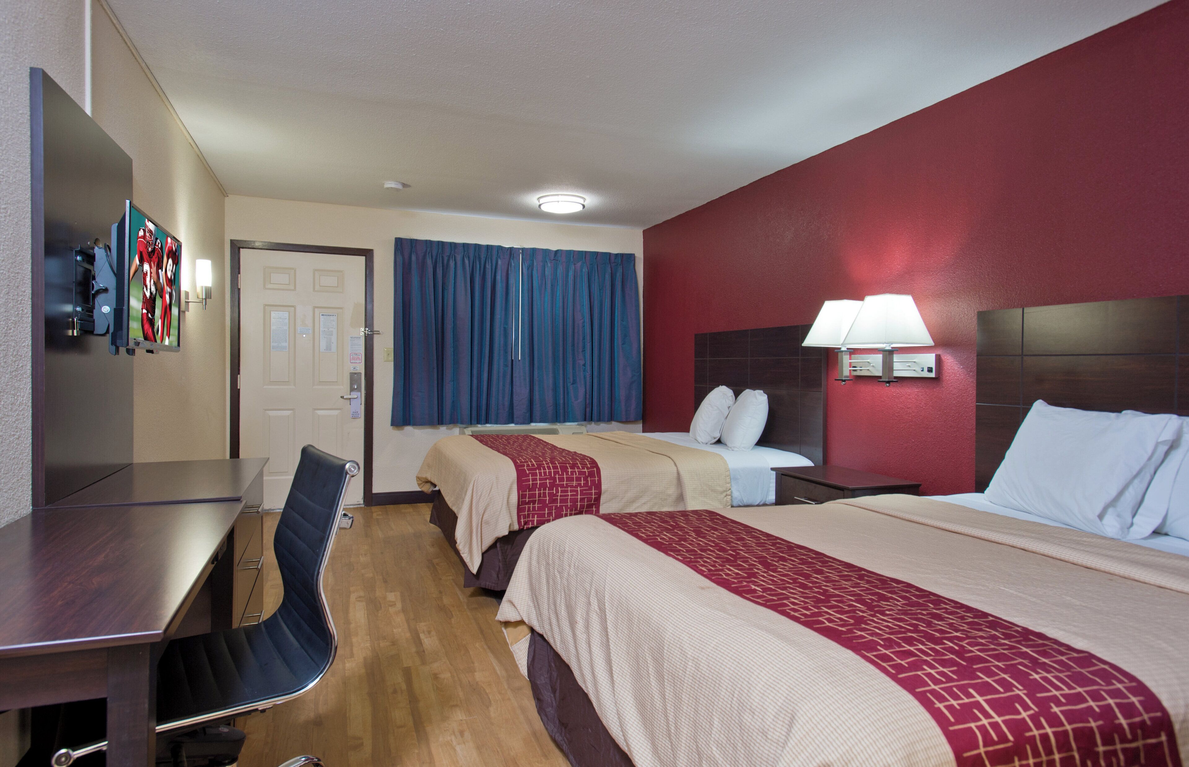 Blackout drapes, cribs (free), WiFi (free), bed sheets