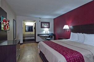 Blackout drapes, cribs (free), WiFi (free), bed sheets
