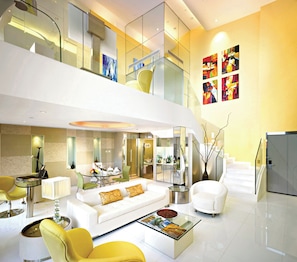 Duplex Suite | In-room safe, desk, laptop workspace, blackout drapes
