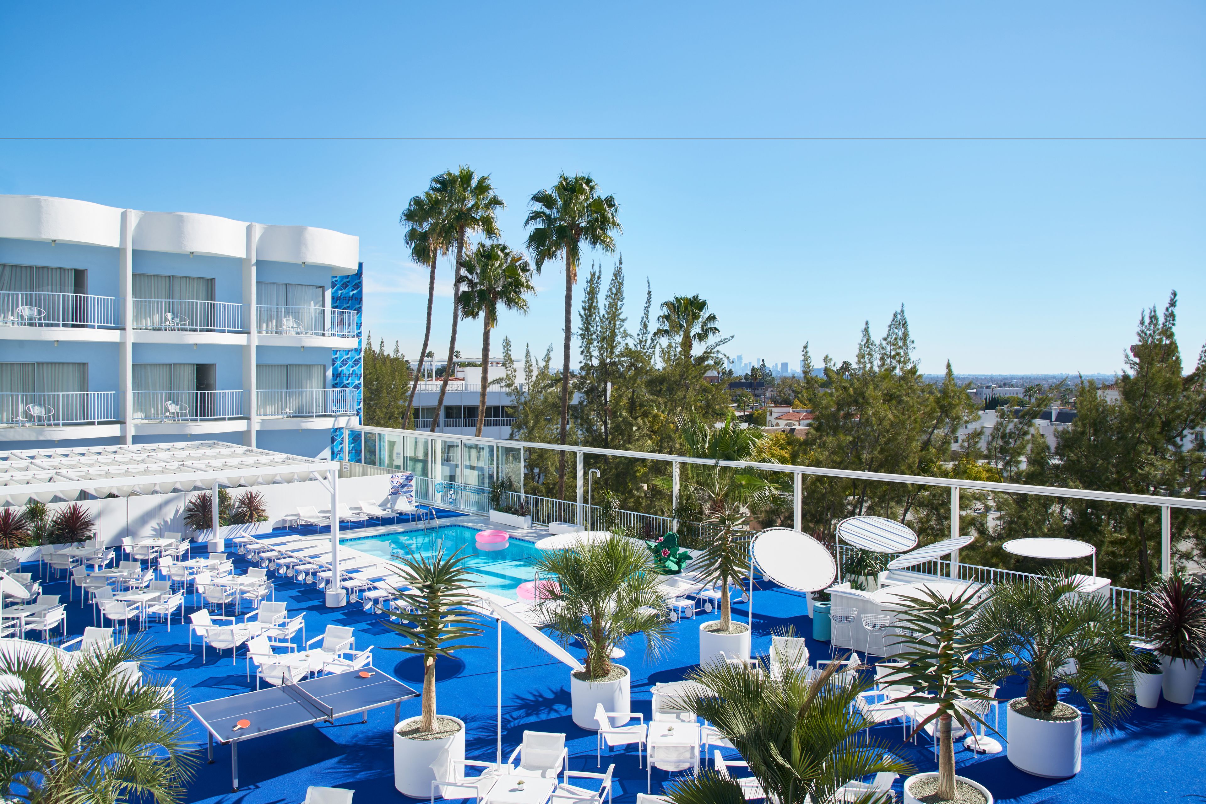 Outdoor pool, open 9:00 AM to 11:00 PM, sun loungers