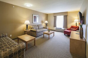 Family Suite | Living area | Flat-screen TV