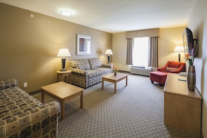 Family Suite | Living area | Flat-screen TV