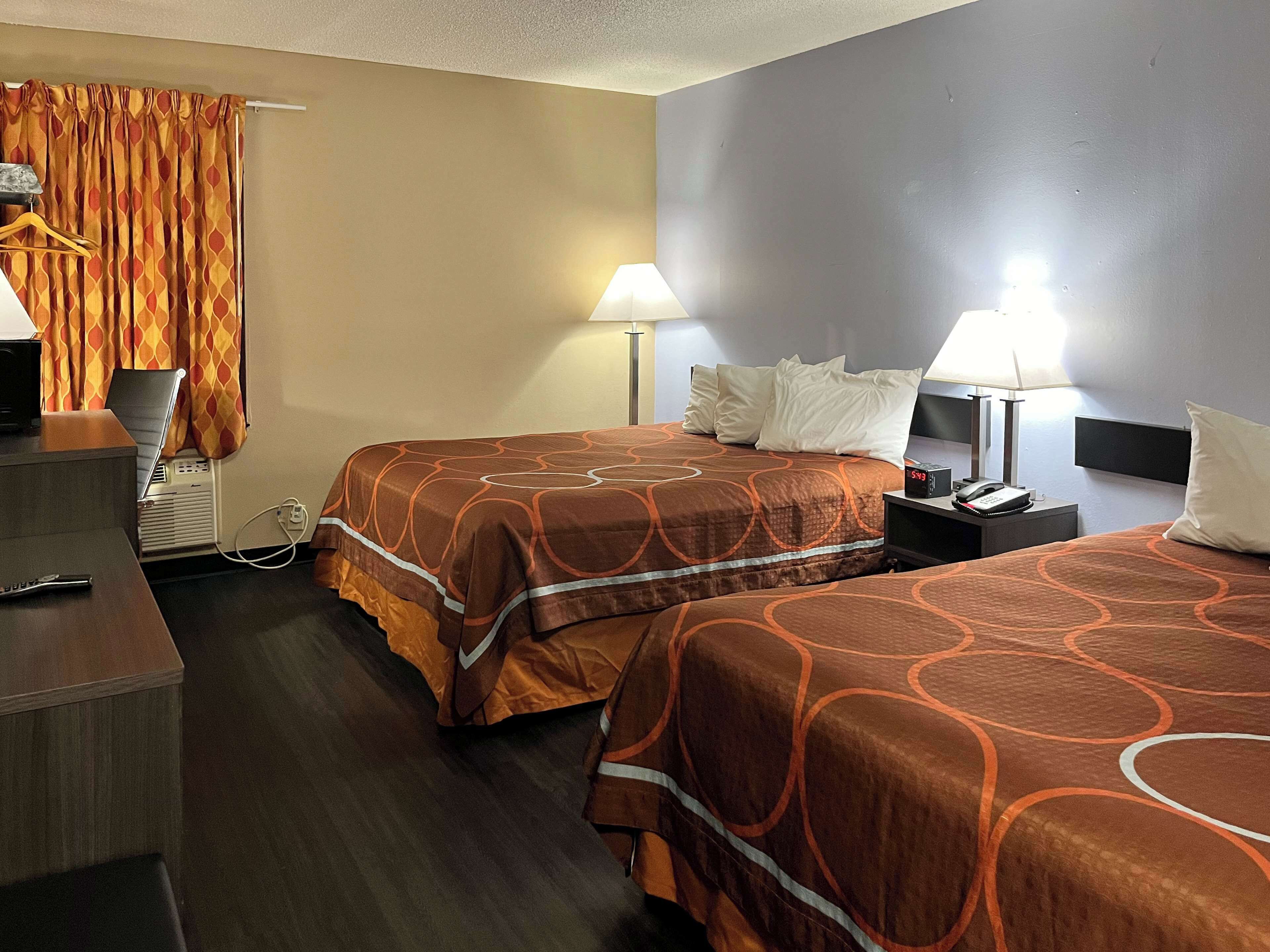 Desk, laptop workspace, blackout curtains, free WiFi