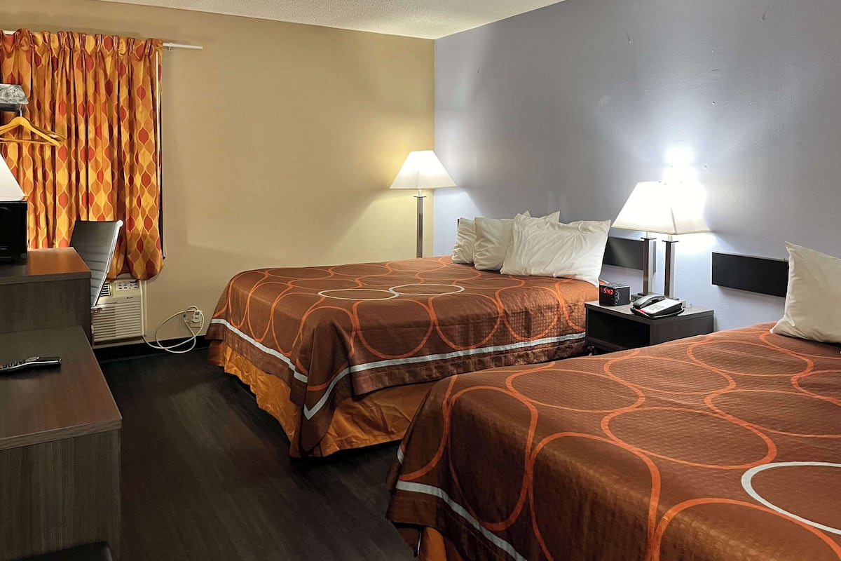 Desk, laptop workspace, blackout curtains, free WiFi