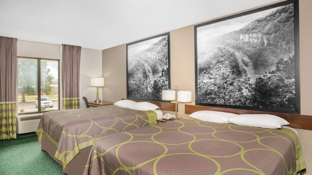 A hotel room with two beds, a large window, and two large landscape paintings on the wall. - Super 8 by Wyndham Bentonville (Bentonville)