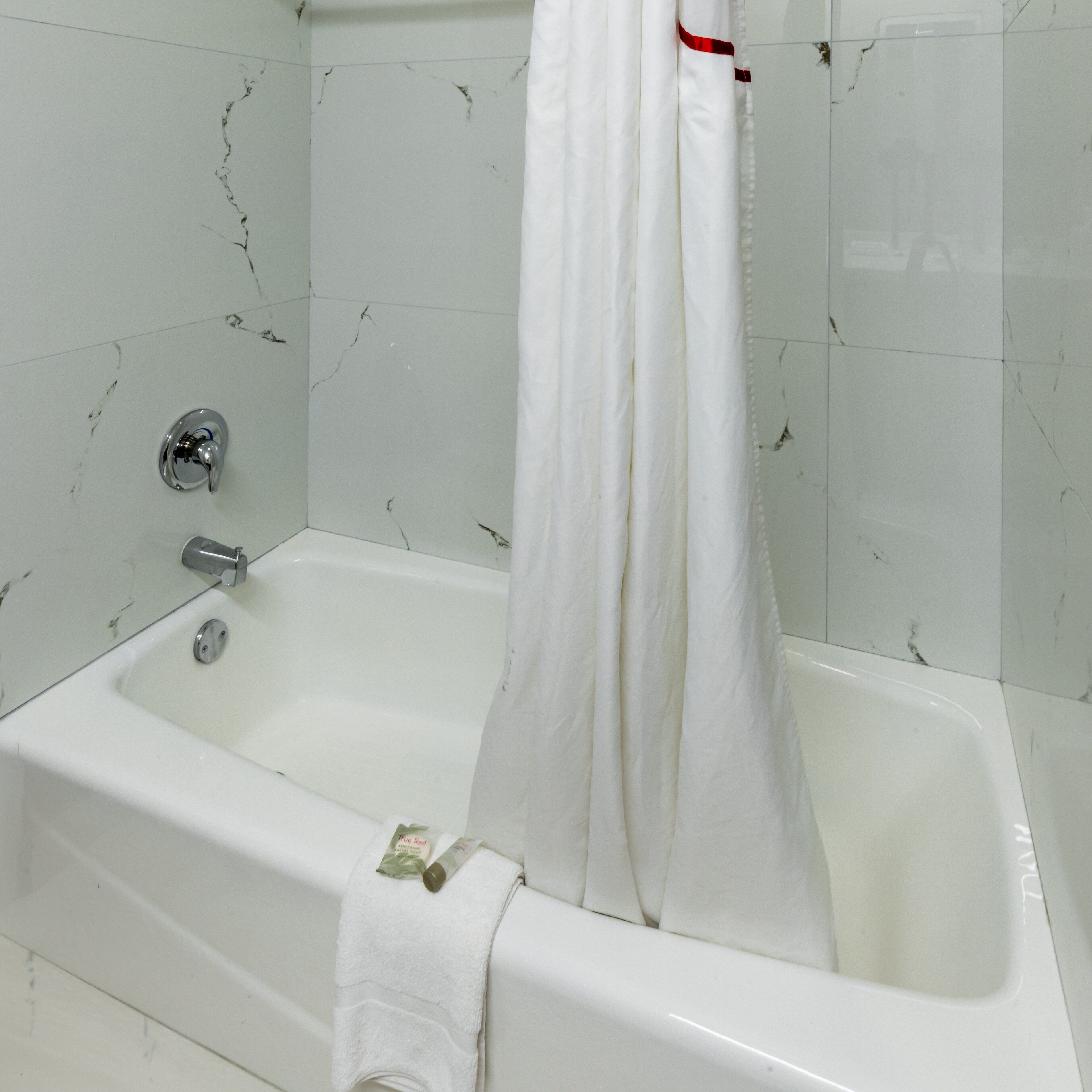 Combined shower/tub, free toiletries, towels, soap