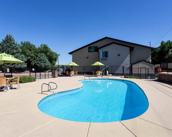 Seasonal outdoor pool, open 9:00 AM to 10:00 PM, sun loungers