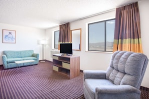 Suite, 1 King Bed | Desk, cots/infant beds, free WiFi, bed sheets