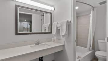 Bathtub, deep soaking tub, towels