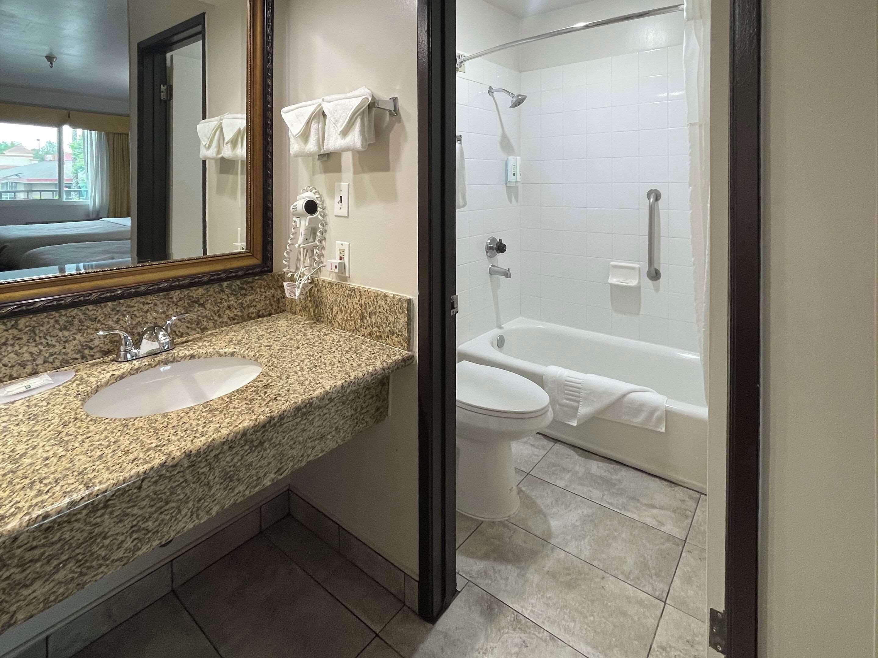 combined shower/bathtub, free toiletries, hair dryer, towels