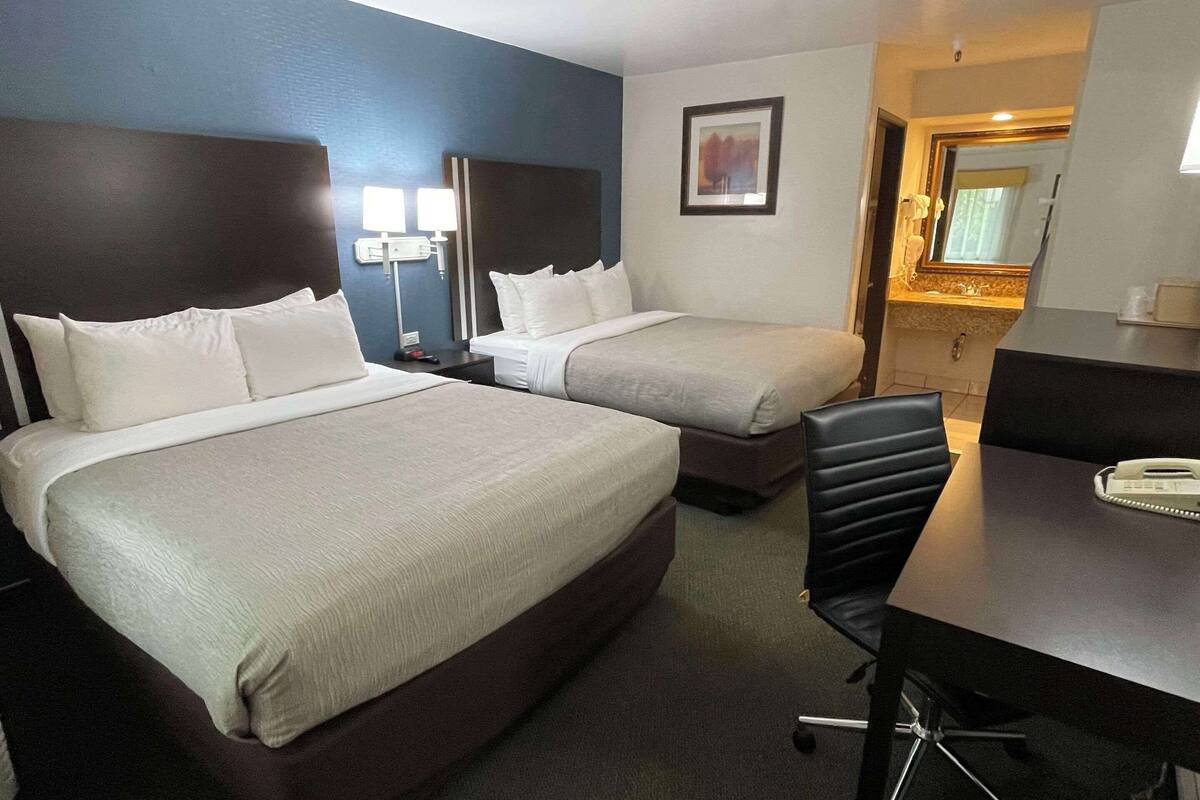 standard room, 2 queen beds, non smoking | 1 bedroom, desk, laptop workspace, blackout curtains