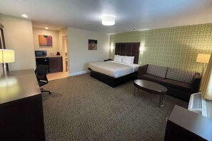 Suite, 1 King Bed with Sofa bed, Non Smoking | Desk, laptop workspace, blackout drapes, iron/ironing board